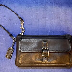 Coach Black buttery soft Leather Wristlet with Front Buckle Accent